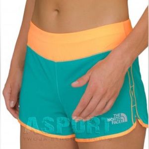 The north face shorts, turquoise and orange women’s size medium